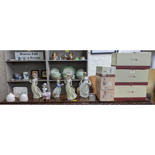 302 - Lladro and Nao Two Lladro bells and a Lladro collectors society plaque, also to include five Nao fig... 