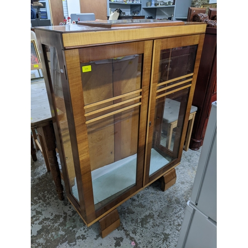 111 - Art Deco walnut display cabinet twin glazed doors, glass internal shelves on shaped block feet 124x8... 