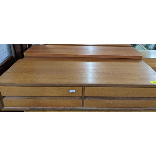 113 - A teak two drawer shelf unit
Location:G