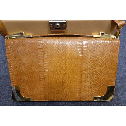 61 - A vintage snakeskin shoulder bag with gold tone hardware and corners, a snakeskin purse, a Kate Land... 