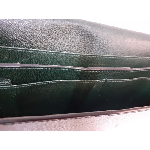 34 - Louis Vuitton- A Robusto briefcase in dark green taiga leather, Serial Number MI 0994, 16