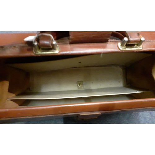 153 - A black Jacob leather briefcase together with two earlier brown leather briefcases Location:1.1