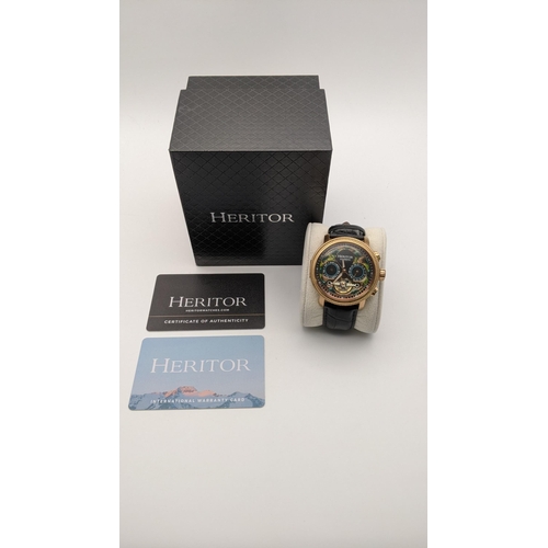 213 - A Heritor automatic aura men's semi skeleton watch on a  leather strap with its box
Location:BWR