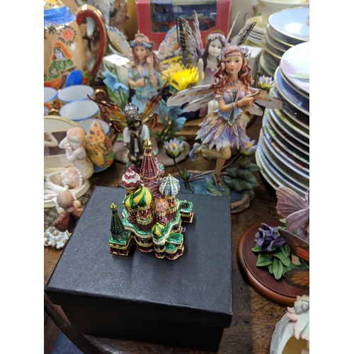 409 - A mixed lot to include Country Artists Secrets Fairy models, other fairy models from the Leonardo Co... 