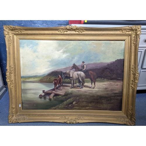 419 - An oil on canvas depicting a man and horses by a lake with mountains to the background 98.5cm x 68cm... 