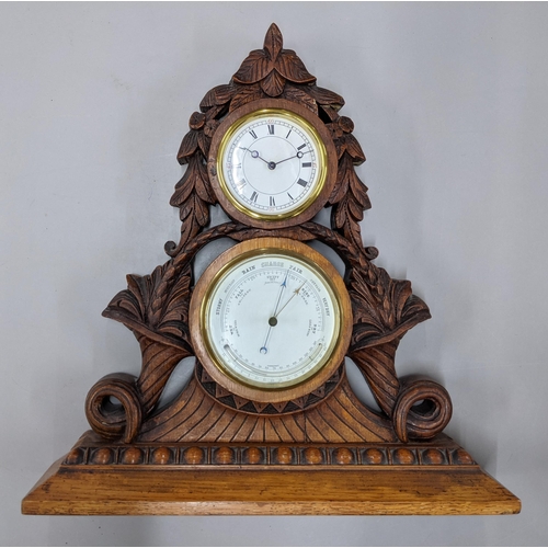 468 - A late Victorian oak carved mantel clock/barometer carved with cornucopias and flowers, on a plinth ... 