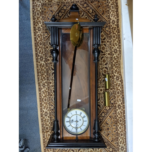 469 - A late Victorian walnut Vienna 8-day wall hanging clock Location:A2M