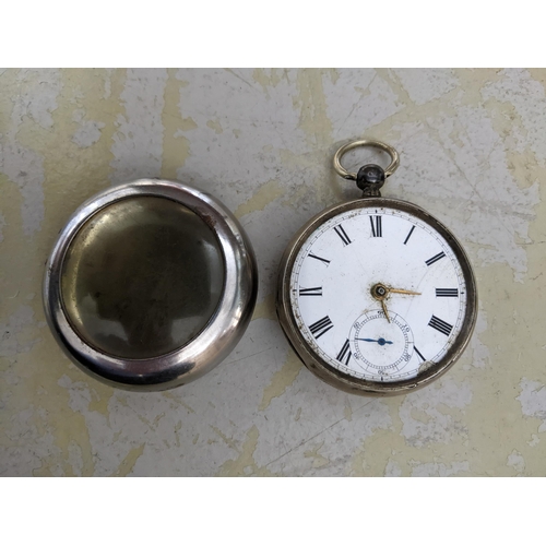 494 - A Waltham key-wound silver cased green faced pocket watch with outside movement marked pab pinion, s... 