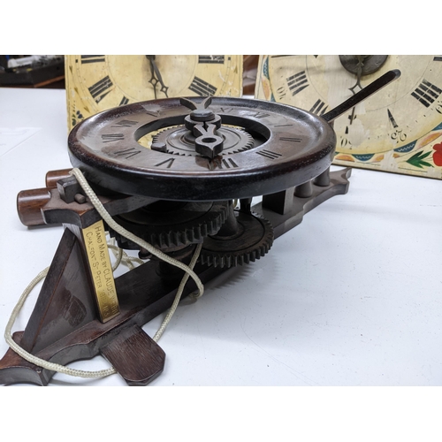 397 - Three 19th century Black Forest wall clock movements, one made entirely of wood, with a twin weight ... 