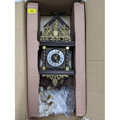 399 - A 20th century wooden cased and brass Dutch wall clock with three weights Location:A2B