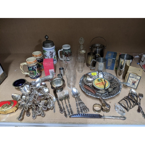 418 - A mixed lot of silver, silver plate, pub memorabilia to include German steins, and other items inclu... 