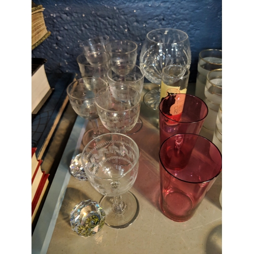 264 - Mixed glassware to include a claret jug with a silver plated top, paperweights, and other items Loca... 