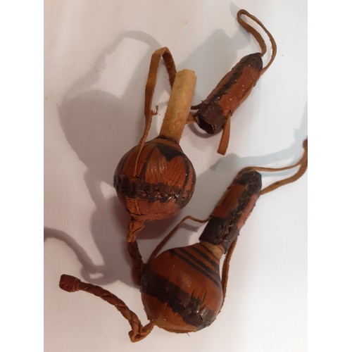 158 - A pair of 1940's Hausa antimony eye make-up containers with leather cord handles  together with  a 1... 