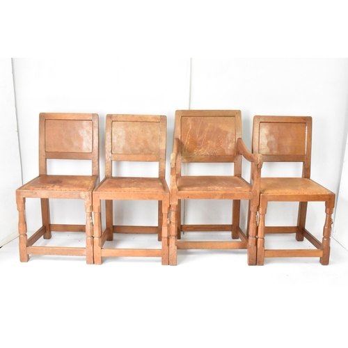 55 - Robert 'Mouseman' Thompson (1876-1955) An oak refectory type dining table and eight chairs, circa 19... 