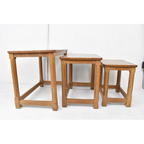 58 - Robert 'Mouseman' Thompson (1876-1955) A nest of three graduating oak 'Mouseman' tables, circa 1979,... 