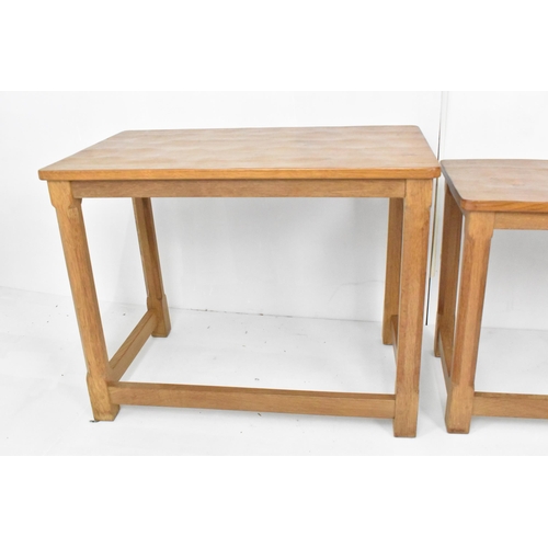 58 - Robert 'Mouseman' Thompson (1876-1955) A nest of three graduating oak 'Mouseman' tables, circa 1979,... 