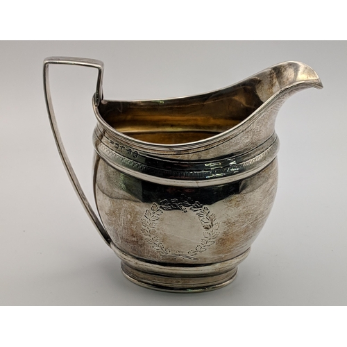 113 - Two silver jugs, one bearing indistinct marks, the other marked London 1915, 246.5g Location: 1.1