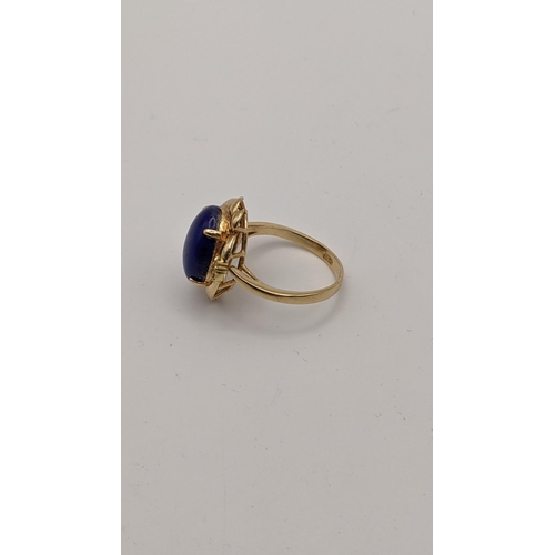 2 - A 14ct gold ring set with Lapis Lazuli gem and diamonds 4.1g
Location: CAB6