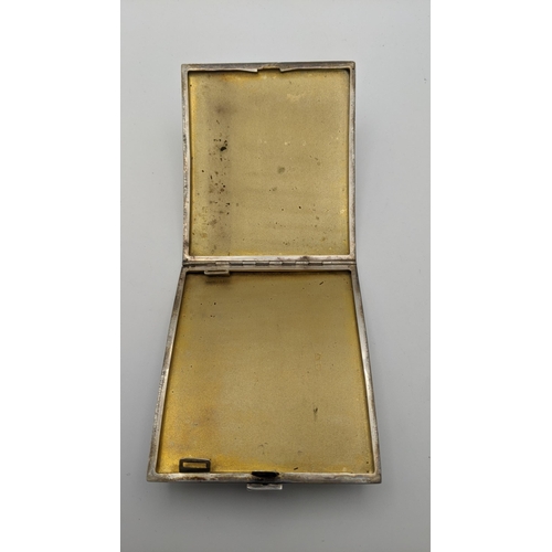 39 - A silver cigarette case, hallmarked Birmingham 1928, 134.1g
Location: A4M