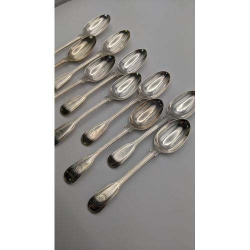 90 - Ten silver fiddle pattern teaspoons hallmarked London 1868, total weight 308g Location: A4F