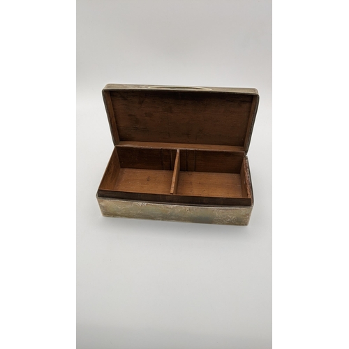 93 - A silver box having a hinged lid hallmarked London 1912 Location: 4.3