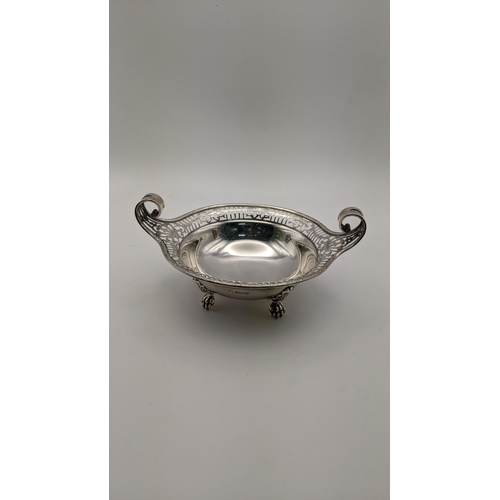 97 - A four-footed bon bon dish having a pierced rim, total weight 136.7g Location: 7.3