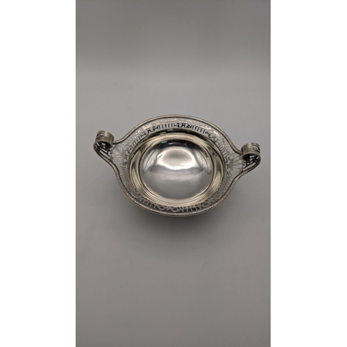 97 - A four-footed bon bon dish having a pierced rim, total weight 136.7g Location: 7.3