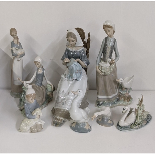 308 - Lladro to include Lladro Embroiderer 4865 figurine, Lladro Girl with Goose 4815 figurine and others
... 