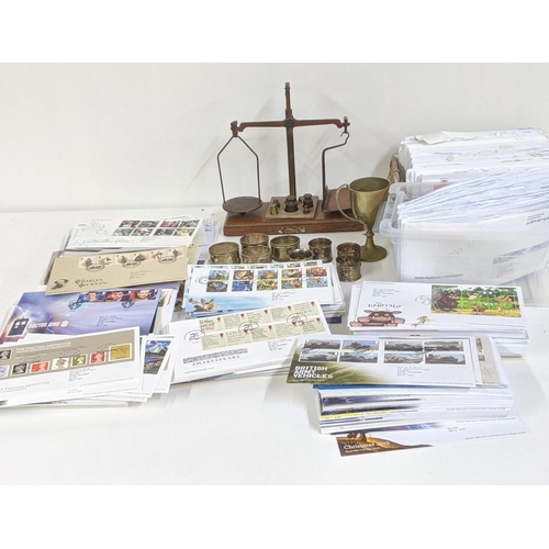 311 - A quantity of first day covers together with precision scales, silver napkin rings
Location:A4F