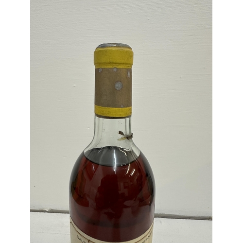 27 - A single bottle of Chateau d''Yquem, Sauternes 1961
Location: R2