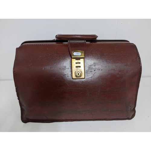 153 - A black Jacob leather briefcase together with two earlier brown leather briefcases Location:1.1