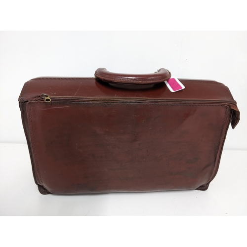 153 - A black Jacob leather briefcase together with two earlier brown leather briefcases Location:1.1