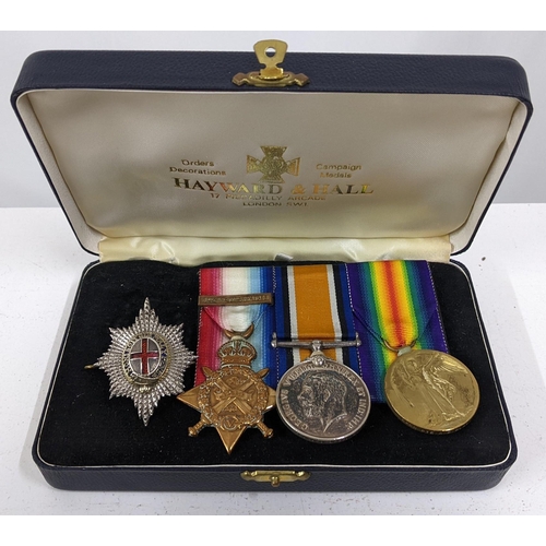 449 - A group of WWI medals named to 6580 PTE A E Glass. C.GDS, together with a Coldstream Guards brooch, ... 