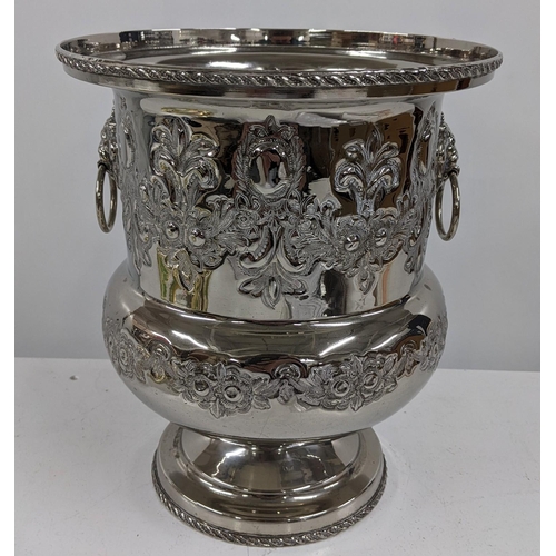 471 - A silver plated wine cooler with embossed decoration and lion mask ring handles, Location:2.1