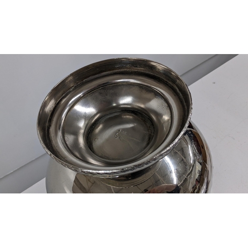 471 - A silver plated wine cooler with embossed decoration and lion mask ring handles, Location:2.1