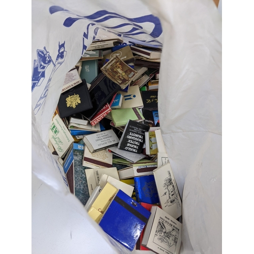 473 - A mixed lot to include mixed books and a quantity of matches, vintage set squares and other items, L... 