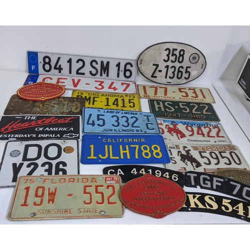 478 - A group of American pressed metal number plates, Location:LAM