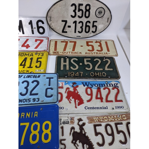 478 - A group of American pressed metal number plates, Location:LAM