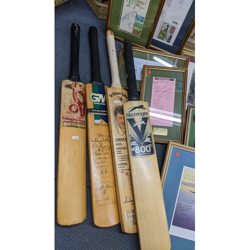 482 - A collection of mainly cricket related items to include signed Sir Donald Bradman first day covers, ... 