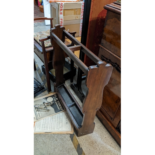 484 - A mixed lot to include an early 20th century oak umbrella stand, typewriter, piano stool, cutlery an... 