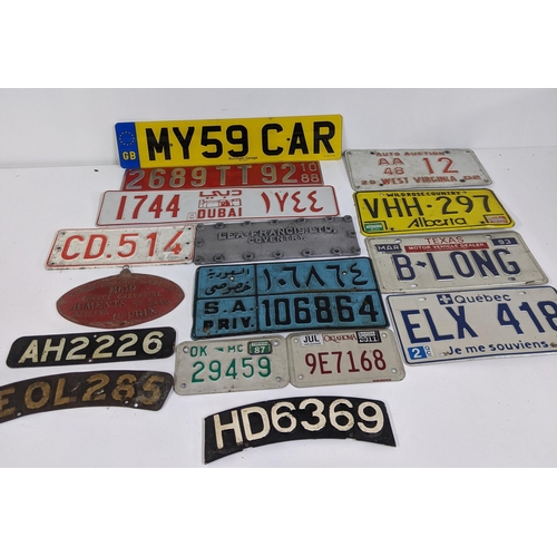 486 - A group of American pressed metal number plates, Location:LAM