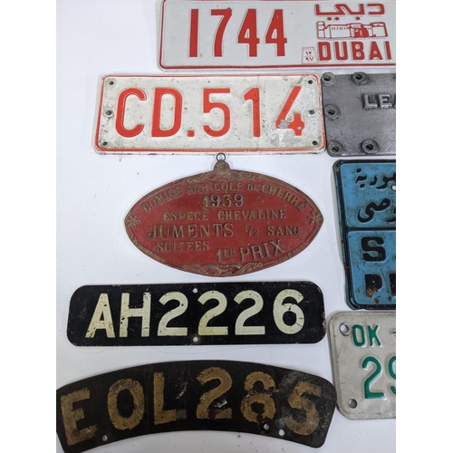 486 - A group of American pressed metal number plates, Location:LAM