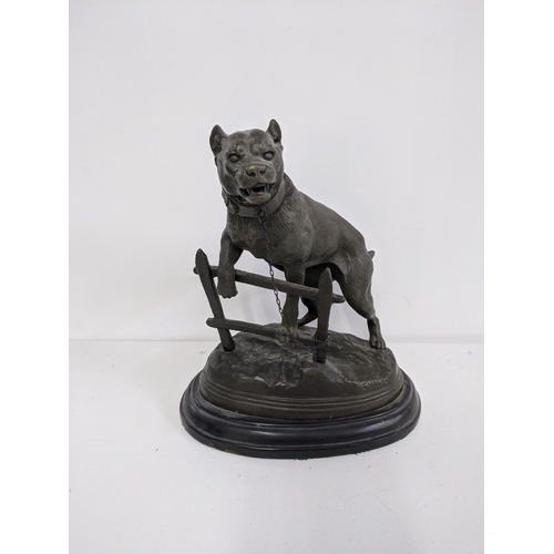 487 - A late 20th century cast bronze model of a dog on a rocky base, signed Calton, Location:3.2