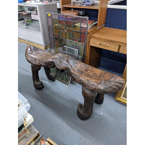 488 - A 20th century carved hardwood two seat bench, fashioned as two fish on shaped legs, 63cm h x 138cm ... 