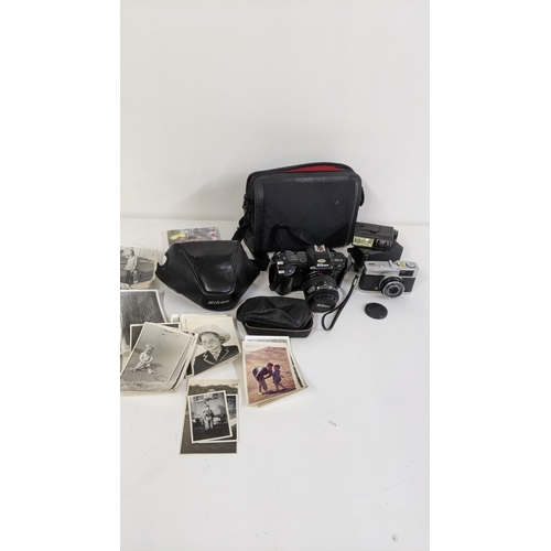 492 - Mixed cameras to include a Nikon F-401, together with an Olympus Trip 35, and other items, along wit... 