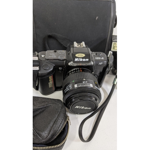 492 - Mixed cameras to include a Nikon F-401, together with an Olympus Trip 35, and other items, along wit... 