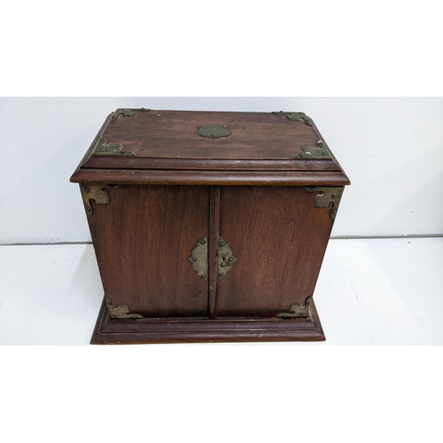 496 - An early 20th century mahogany smokers cabinet with a decanter and glasses, Location:4.1