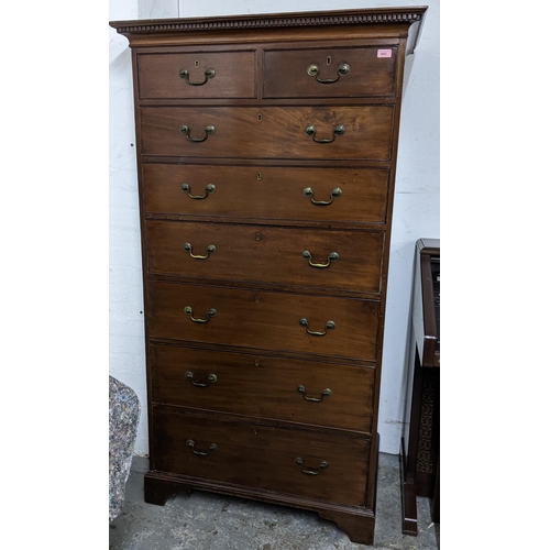 443 - A Victorian mahogany tall chest of short above six graduated long drawers below, a dentil moulded co... 