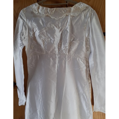 54 - A bespoke 1960's white satin and embroidered wedding gown with train having an Broderie Anglaise sty... 