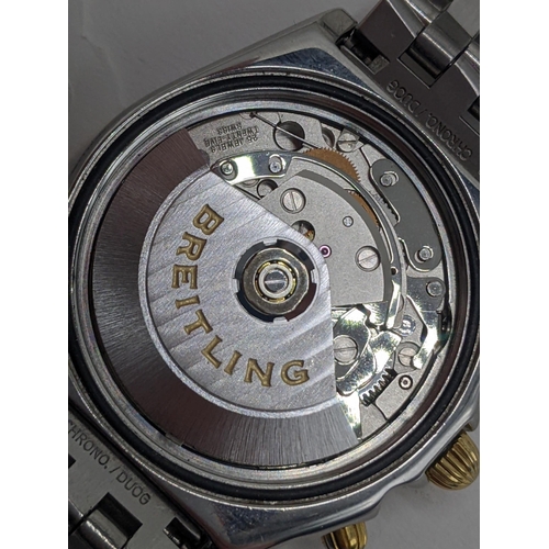 56 - A Breitling Chronomat chronograph gents, automatic, stainless steel wristwatch with gold rider tabs,... 